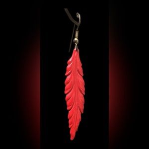 Red feather shaped dangle earrings